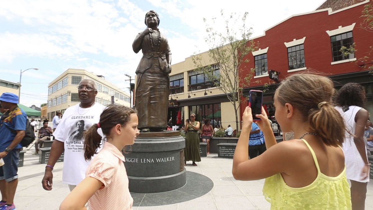 The community celebration at the unveiling of the Maggie L. Walker monument.
