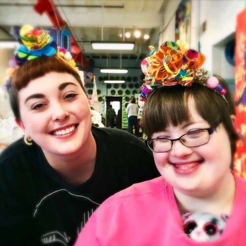 Program Director Nancy Epling and  Artist Tiffany Grubb wearing Tina’s Tiaras with Mini Passion Flowers, 2018.