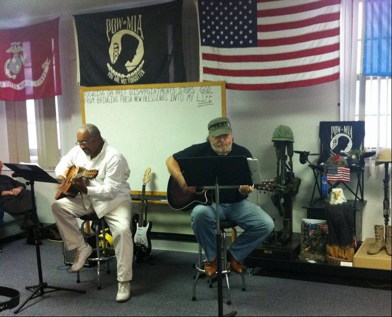 Performing music can be a powerful healing activity for Veterans. (Photo: Daily Herald)
