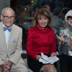 Harry Kullijian, Congresswoman Jackie Speier, and Carol Channing review the congressional resolution. Image by Jamie L. M