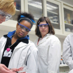 STEM students pictured in lab.