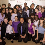 Taye Diggs with students at the New York City Department of Education headquarters.  Diane Bondareff/Invision/AP/Shutterstock